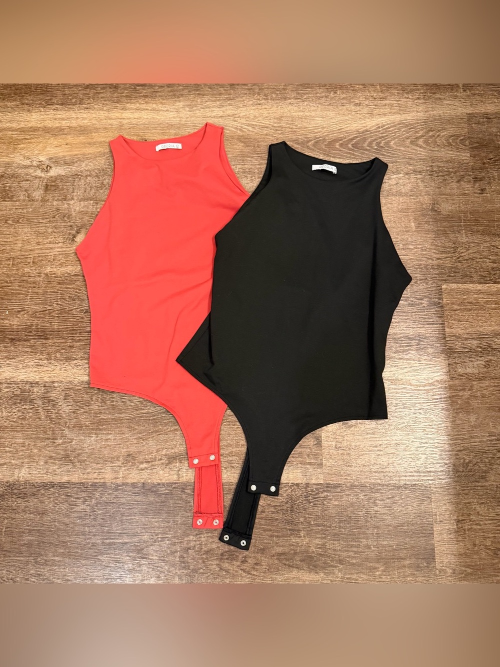 ReoRia Ribbed Sleeveless Snap-Front Bodysuits in Black & Coral